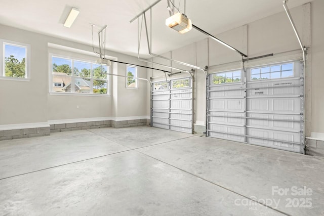 4930 Killian Crossing Dr, Denver, NC 28037 - garage with a garage door opener and baseboards