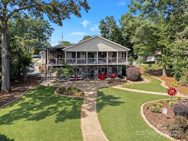 643 Lake Dr Unit 10, Lexington, NC 27292 - rear view of property featuring a yard and a patio area