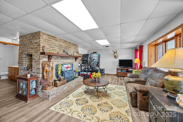 643 Lake Dr Unit 10, Lexington, NC 27292 - living room with a drop ceiling, wood finished floors, and a fireplace