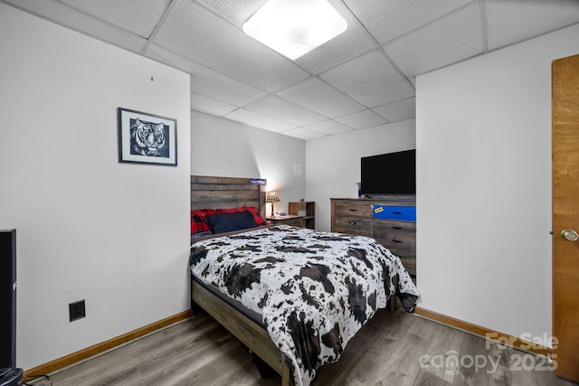 643 Lake Dr Unit 10, Lexington, NC 27292 - bedroom with a drop ceiling and wood finished floors