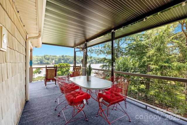 643 Lake Dr Unit 10, Lexington, NC 27292 - view of patio featuring a water view and view of wooded area