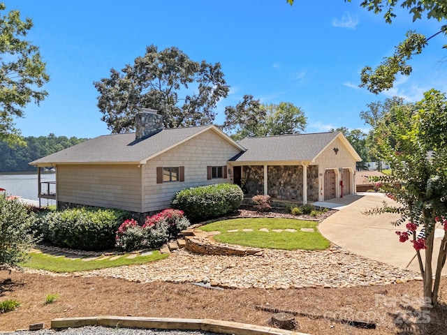 643 Lake Dr Unit 10, Lexington, NC 27292 - single story home featuring driveway, a chimney, a garage, and roof with shingles