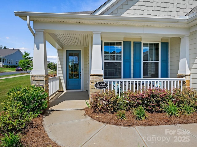 10305 Superb Ln, Charlotte, NC 28215 - doorway to property featuring a porch