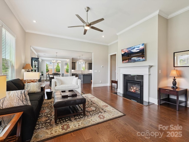 10305 Superb Ln, Charlotte, NC 28215 - living area with a ceiling fan, wood finished floors, a fireplace with flush hearth, a chandelier, and recessed lighting