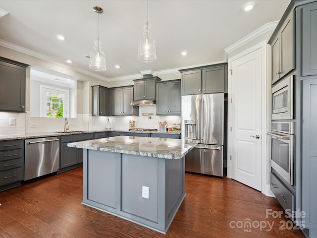 10305 Superb Ln, Charlotte, NC 28215 - kitchen with stainless steel appliances, ornamental molding, light stone countertops, dark wood-style flooring, and backsplash
