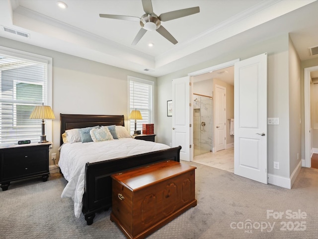 10305 Superb Ln, Charlotte, NC 28215 - bedroom featuring carpet floors, crown molding, a tray ceiling, recessed lighting, and connected bathroom