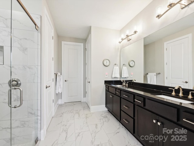 10305 Superb Ln, Charlotte, NC 28215 - bathroom featuring marble finish floors, double vanity, and a stall shower