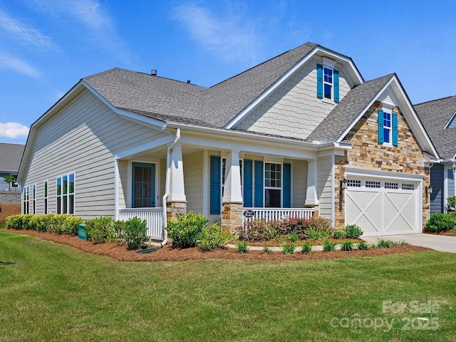 10305 Superb Ln, Charlotte, NC 28215 - craftsman-style house with covered porch, stone siding, roof with shingles, driveway, and a front yard