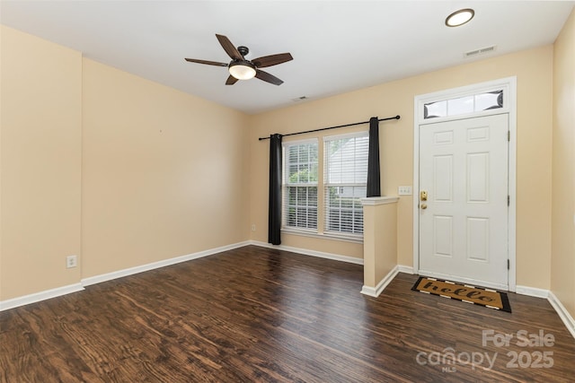4208 Carl Parmer Dr, Harrisburg, NC 28075 - entrance foyer with wood finished floors and a ceiling fan