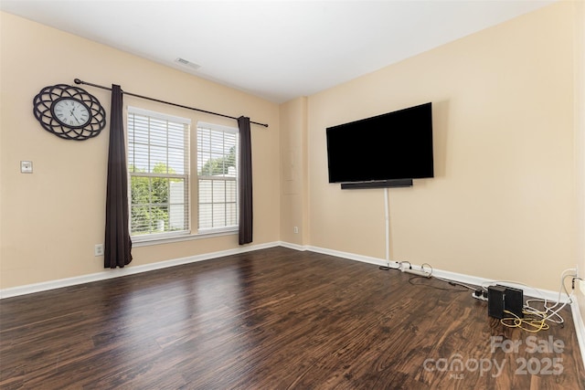 4208 Carl Parmer Dr, Harrisburg, NC 28075 - unfurnished living room with wood finished floors and baseboards
