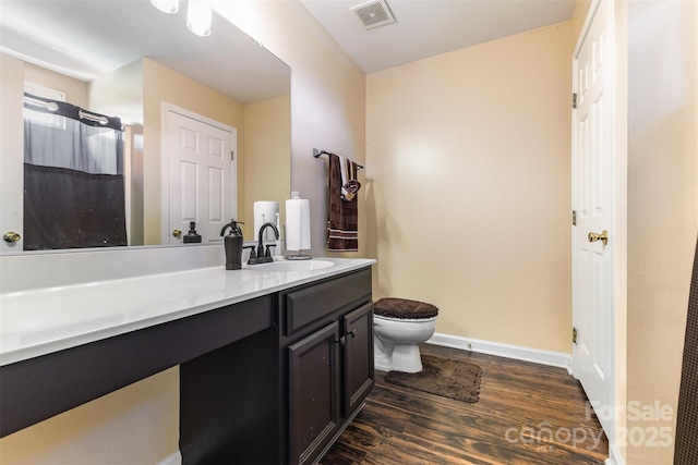 4208 Carl Parmer Dr, Harrisburg, NC 28075 - full bathroom featuring wood finished floors, vanity, and a shower