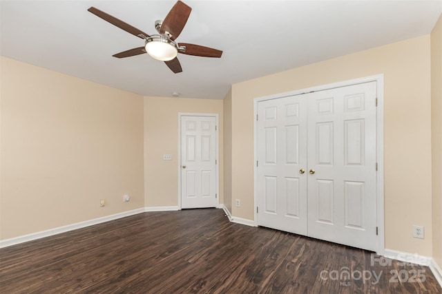 4208 Carl Parmer Dr, Harrisburg, NC 28075 - unfurnished bedroom featuring dark wood-style floors, a closet, and a ceiling fan