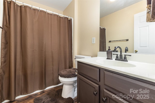 4208 Carl Parmer Dr, Harrisburg, NC 28075 - full bath with wood finished floors, vanity, and a shower with shower curtain