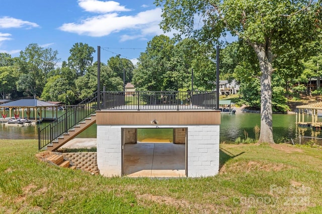 172 Honeydew Cir, Troutman, NC 28166 - dock with a yard, stairway, a water view, and view of wooded area