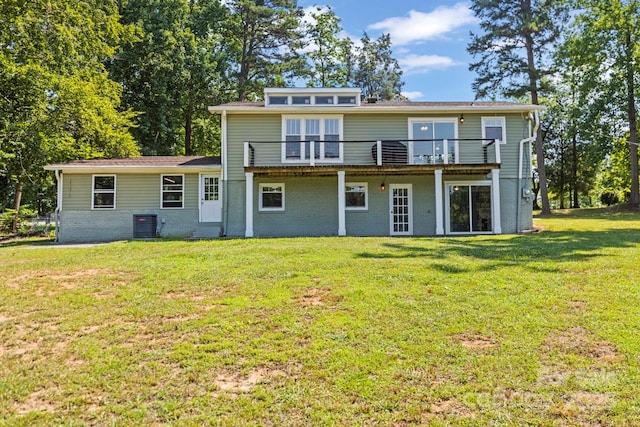 172 Honeydew Cir, Troutman, NC 28166 - rear view of property with a yard, a wooden deck, and brick siding