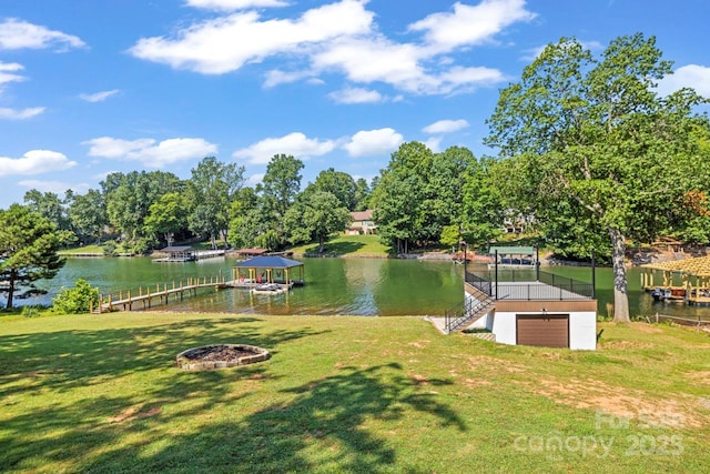 172 Honeydew Cir, Troutman, NC 28166 - dock area featuring a water view, a yard, and a fire pit