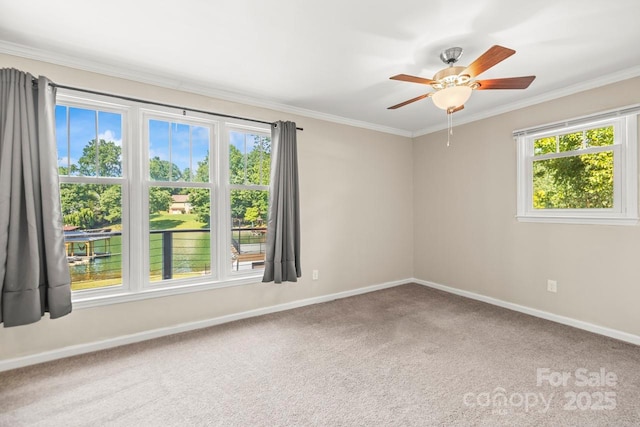 172 Honeydew Cir, Troutman, NC 28166 - carpeted empty room featuring healthy amount of natural light, ceiling fan, and crown molding