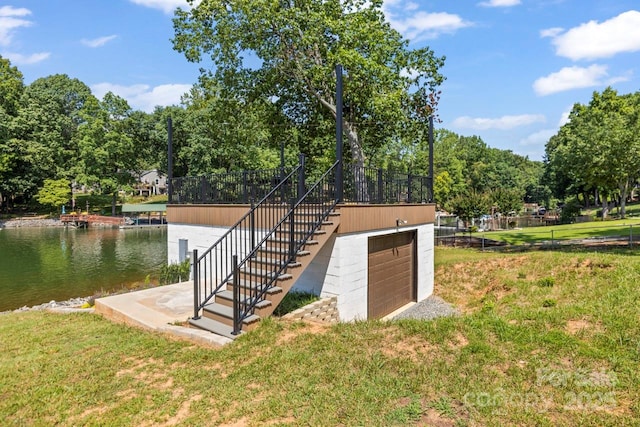 172 Honeydew Cir, Troutman, NC 28166 - dock featuring stairs, a lawn, and a water view