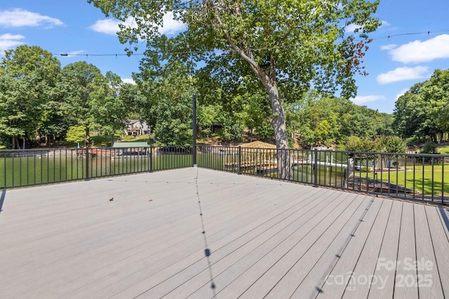 172 Honeydew Cir, Troutman, NC 28166 - deck featuring view of wooded area and a yard