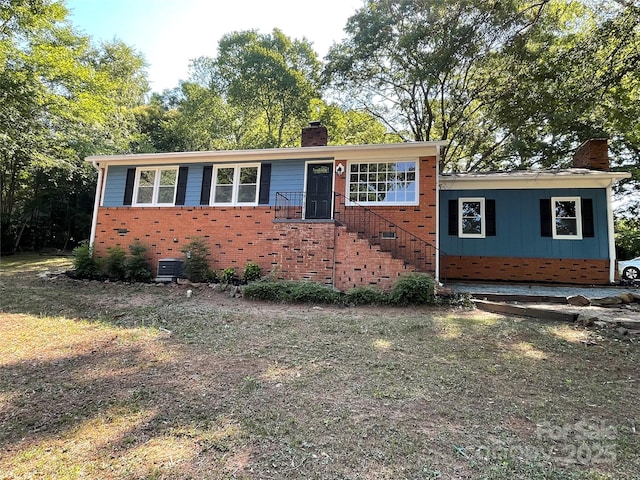 1320 Kings Cir, Shelby, NC 28150 - split level home featuring a chimney and brick siding