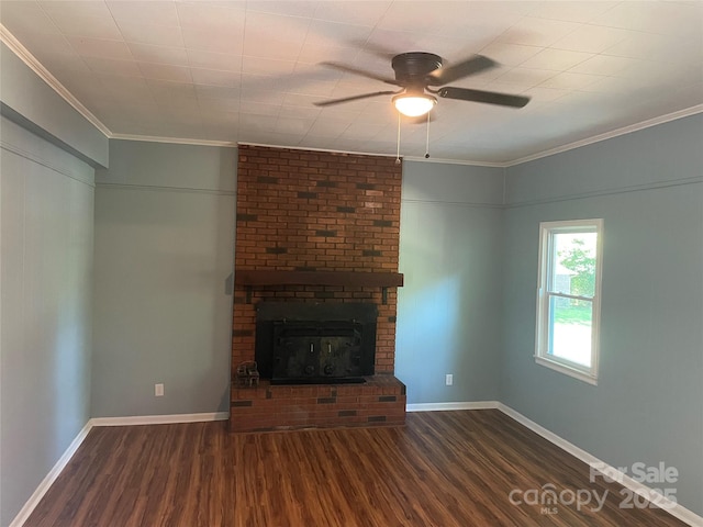 1320 Kings Cir, Shelby, NC 28150 - unfurnished living room with wood finished floors, ceiling fan, crown molding, and a brick fireplace