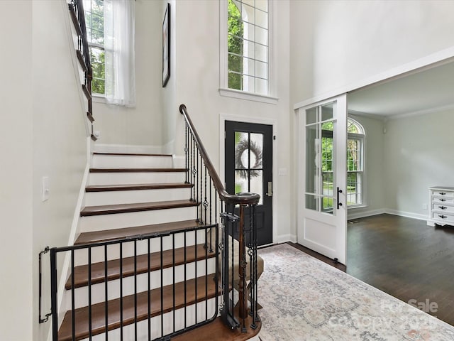 4032 Cambridge Hill Ln, Charlotte, NC 28270 - foyer entrance with wood finished floors, stairway, and a high ceiling