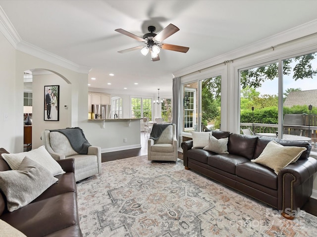 4032 Cambridge Hill Ln, Charlotte, NC 28270 - living room with ornamental molding, ceiling fan, arched walkways, recessed lighting, and wood finished floors