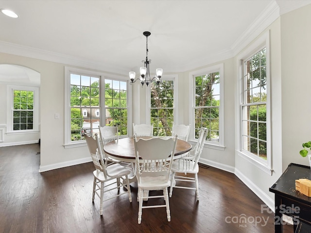 4032 Cambridge Hill Ln, Charlotte, NC 28270 - dining space featuring a chandelier, healthy amount of natural light, arched walkways, and ornamental molding