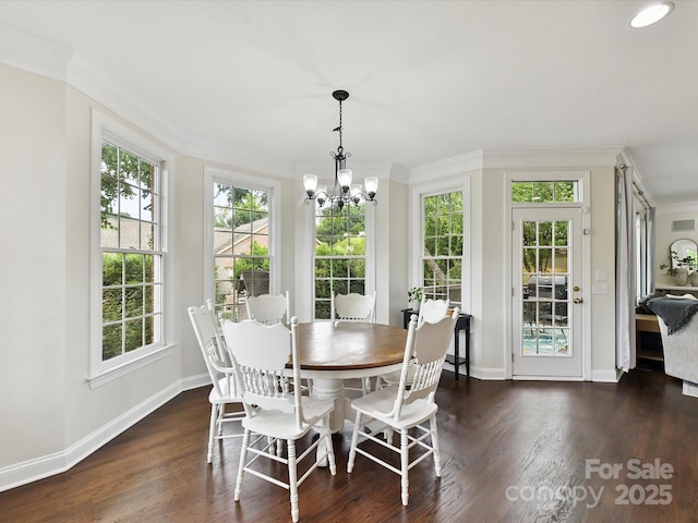 4032 Cambridge Hill Ln, Charlotte, NC 28270 - dining area with plenty of natural light, crown molding, a chandelier, and wood finished floors