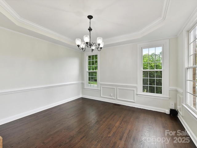 4032 Cambridge Hill Ln, Charlotte, NC 28270 - spare room featuring a chandelier, ornamental molding, a raised ceiling, and plenty of natural light