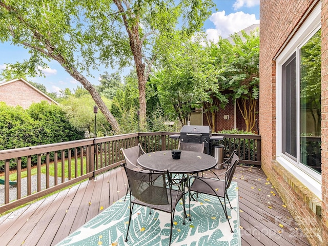 4032 Cambridge Hill Ln, Charlotte, NC 28270 - deck featuring outdoor dining area and a grill