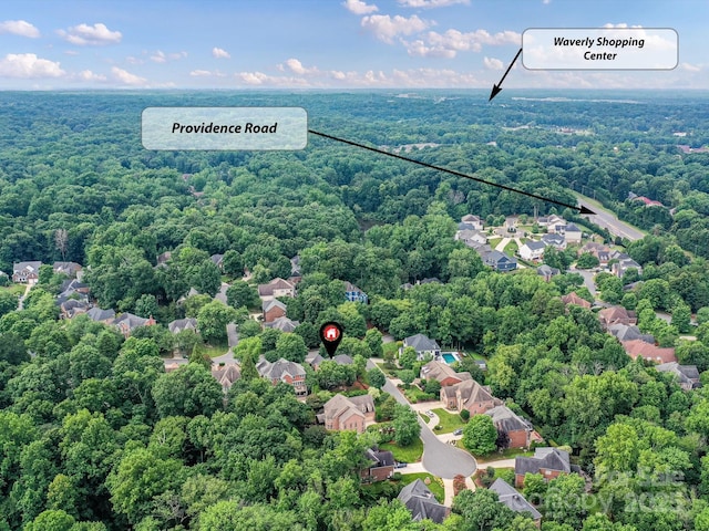 4032 Cambridge Hill Ln, Charlotte, NC 28270 - aerial perspective of suburban area with a forest