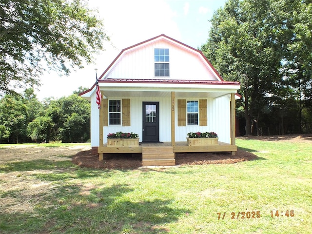 1732 Rocky River Rd, Lancaster, SC 29720 - colonial inspired home with a gambrel roof, covered porch, and a front lawn