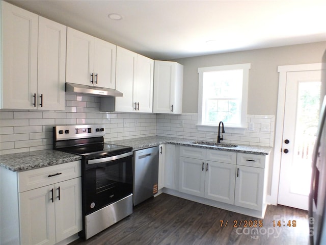 1732 Rocky River Rd, Lancaster, SC 29720 - kitchen featuring stainless steel appliances, under cabinet range hood, white cabinets, and dark wood-style floors