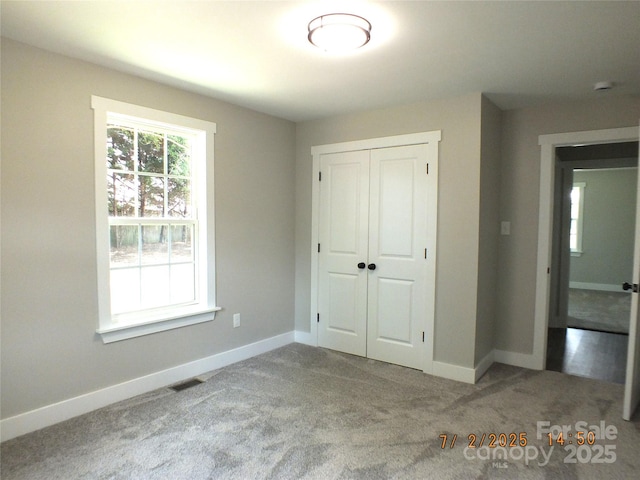 1732 Rocky River Rd, Lancaster, SC 29720 - unfurnished bedroom with a closet and carpet flooring