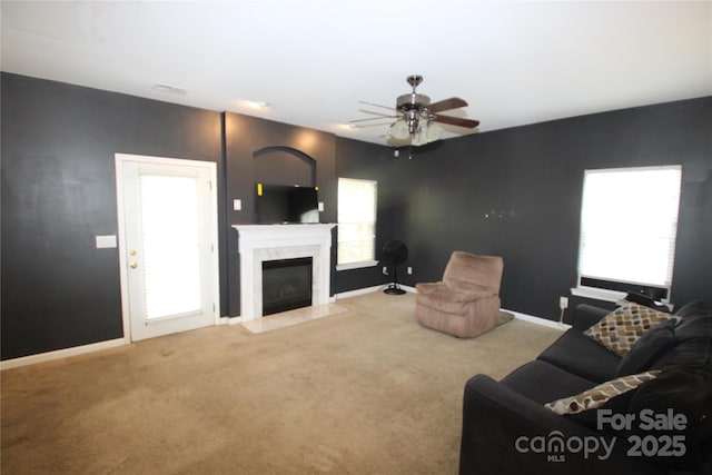 2418 Alaqua Ct, Matthews, NC 28105 - living area featuring a fireplace, ceiling fan, and carpet flooring