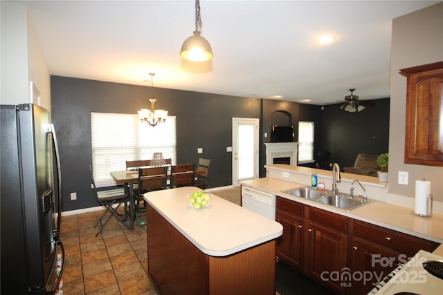 2418 Alaqua Ct, Matthews, NC 28105 - kitchen featuring stainless steel fridge with ice dispenser, ceiling fan, a fireplace, light countertops, and dishwasher