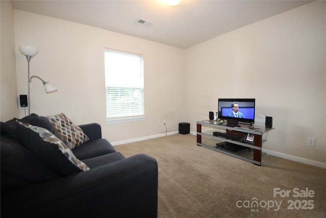 2418 Alaqua Ct, Matthews, NC 28105 - carpeted living area featuring baseboards
