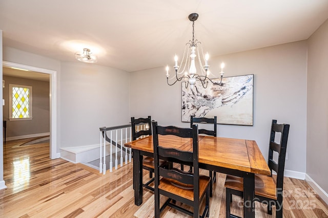 221 Roberts Ln, Lenoir, NC 28645 - dining room with a chandelier and light wood-type flooring