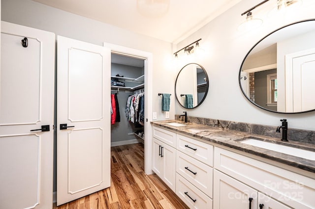 221 Roberts Ln, Lenoir, NC 28645 - full bath with double vanity, wood finished floors, and a walk in closet