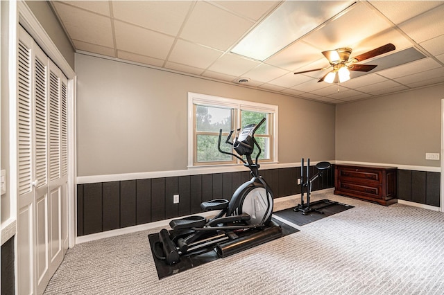 221 Roberts Ln, Lenoir, NC 28645 - workout room featuring a wainscoted wall, carpet floors, a paneled ceiling, ceiling fan, and wooden walls