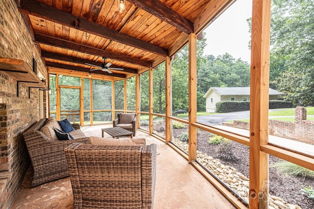 221 Roberts Ln, Lenoir, NC 28645 - unfurnished sunroom with a ceiling fan, beamed ceiling, an outdoor hangout area, and plenty of natural light