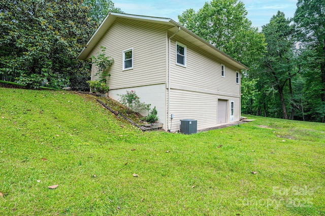 221 Roberts Ln, Lenoir, NC 28645 - view of home's exterior with an attached garage and a lawn