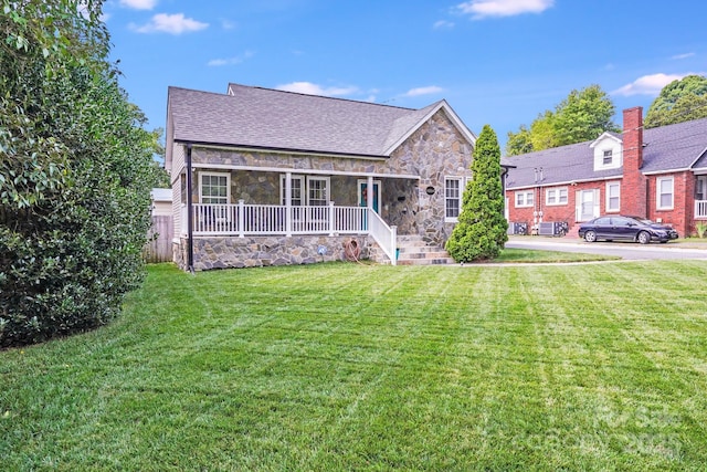1004 Venus St, Kannapolis, NC 28083 - view of front of home with stone siding, a porch, and a shingled roof