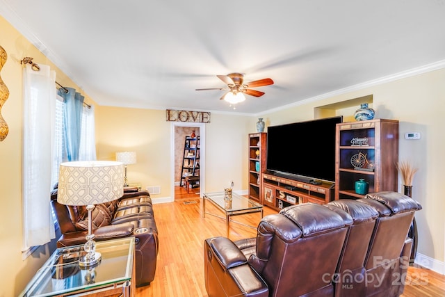 1004 Venus St, Kannapolis, NC 28083 - living area featuring a ceiling fan, wood finished floors, and ornamental molding