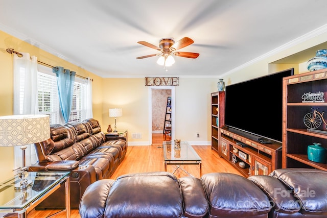 1004 Venus St, Kannapolis, NC 28083 - living area with a ceiling fan, wood finished floors, and ornamental molding