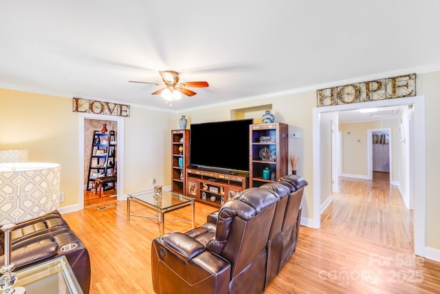 1004 Venus St, Kannapolis, NC 28083 - living area featuring a ceiling fan, light wood-type flooring, and crown molding