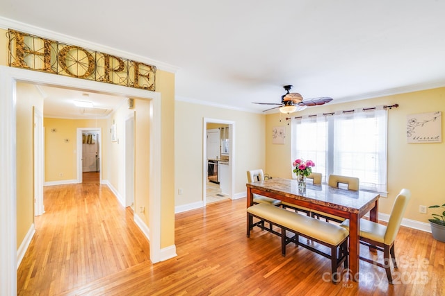1004 Venus St, Kannapolis, NC 28083 - dining space featuring light wood-style flooring, crown molding, ceiling fan, and attic access