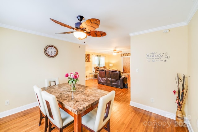 1004 Venus St, Kannapolis, NC 28083 - dining space with a ceiling fan, ornamental molding, and light wood-style flooring