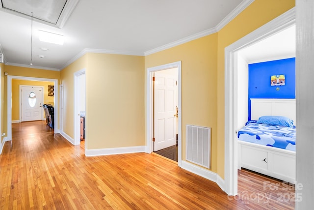 1004 Venus St, Kannapolis, NC 28083 - corridor with attic access, light wood-style floors, and ornamental molding